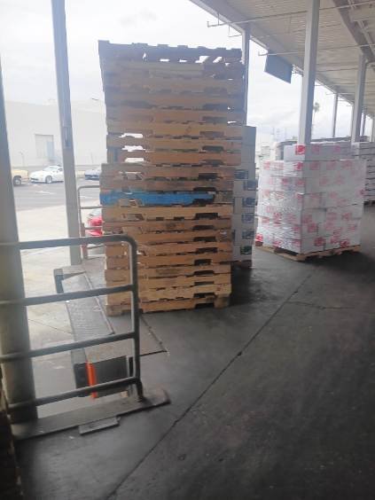 Forklift loading pallets for pickup and removal